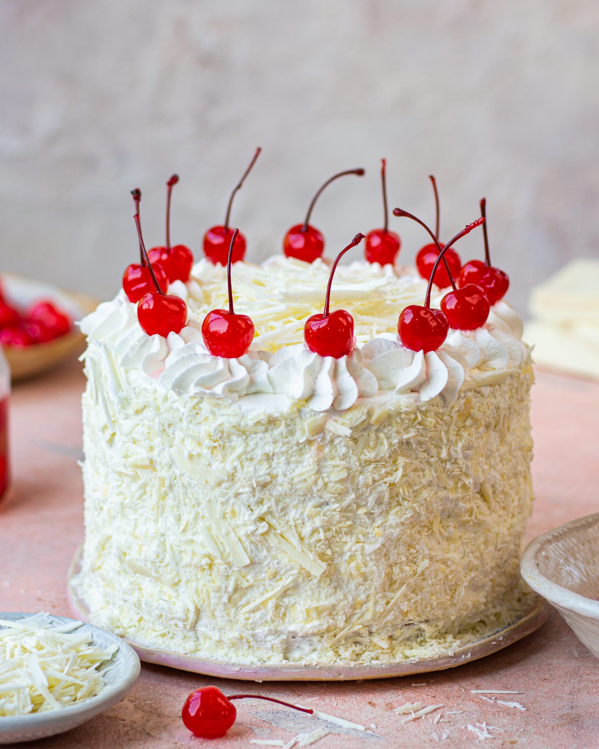 Appetizing big fresh pastry cake covered by white cream icing and decorate  sweet flower serving on table. Tasty wedding event delightful dessert ready  Stock Photo - Alamy