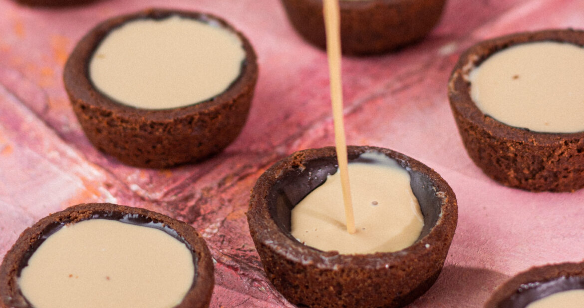 chocolate cookie cups with cold coffee