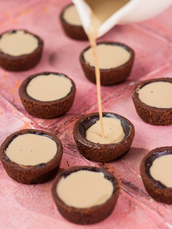 chocolate cookie cups with cold coffee