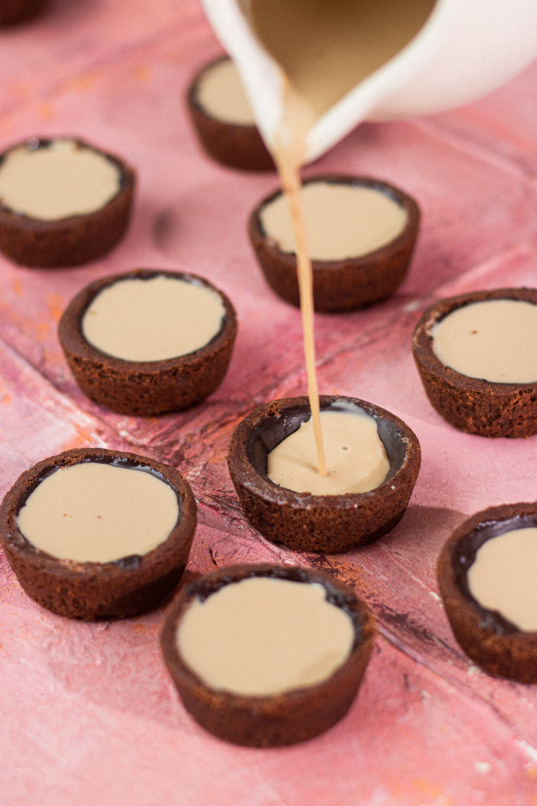 chocolate cookie cups with cold coffee